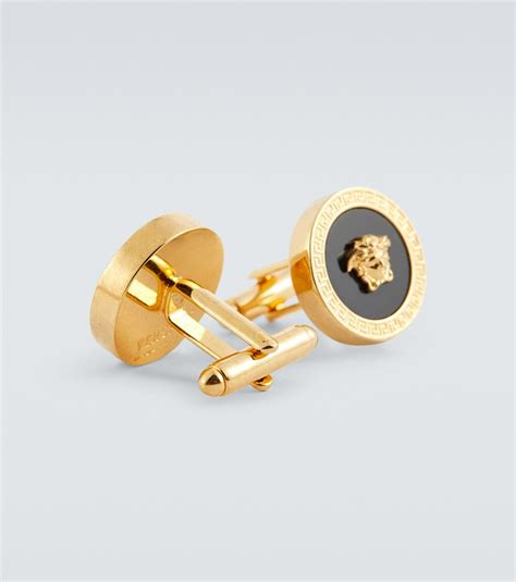 versace cufflinks.